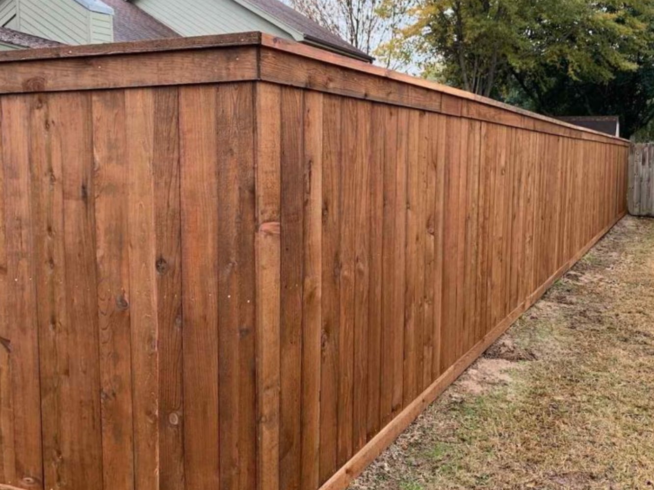 Foreman AK cap and trim style wood fence