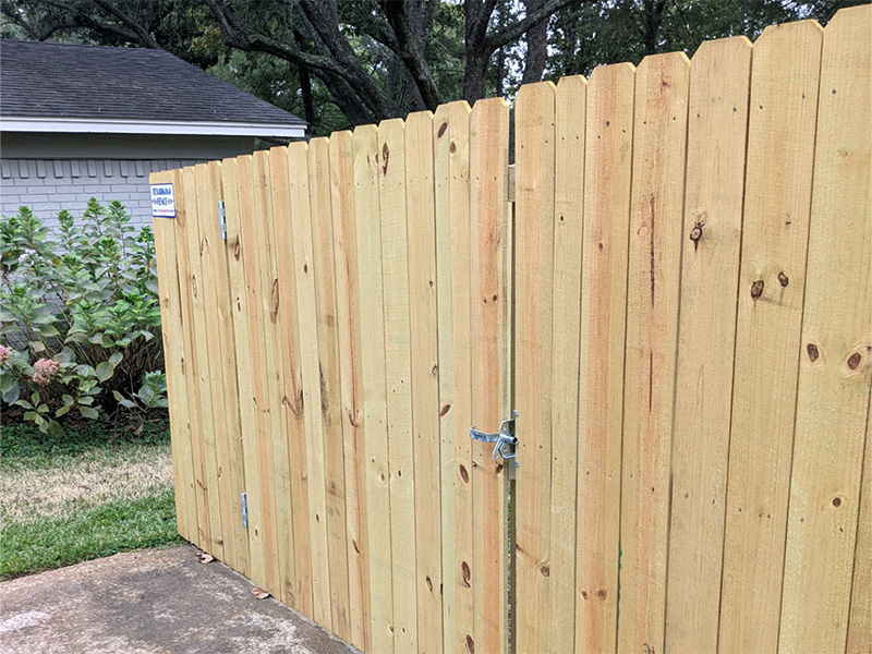 Lewisville AK stockade style wood fence